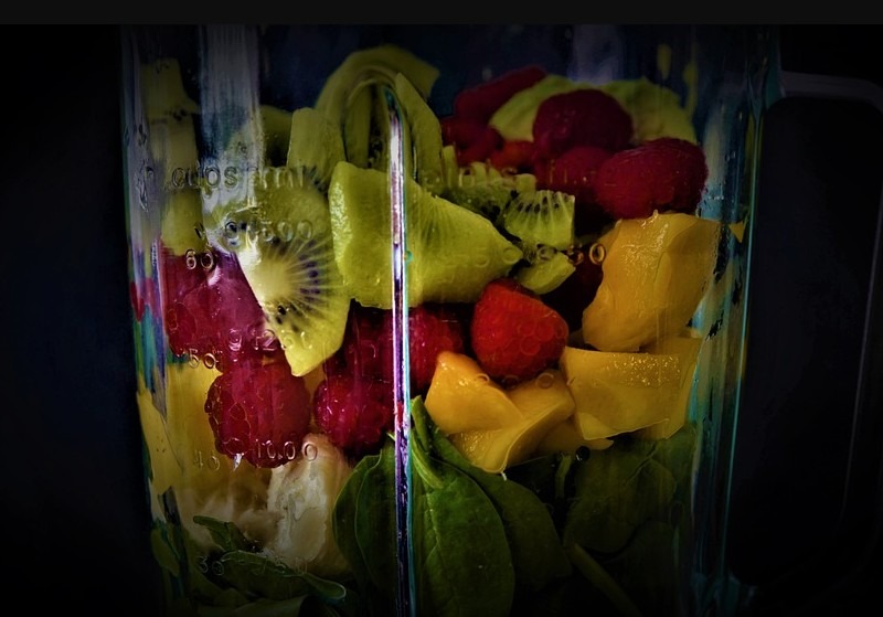 various fruits inside a blender jar