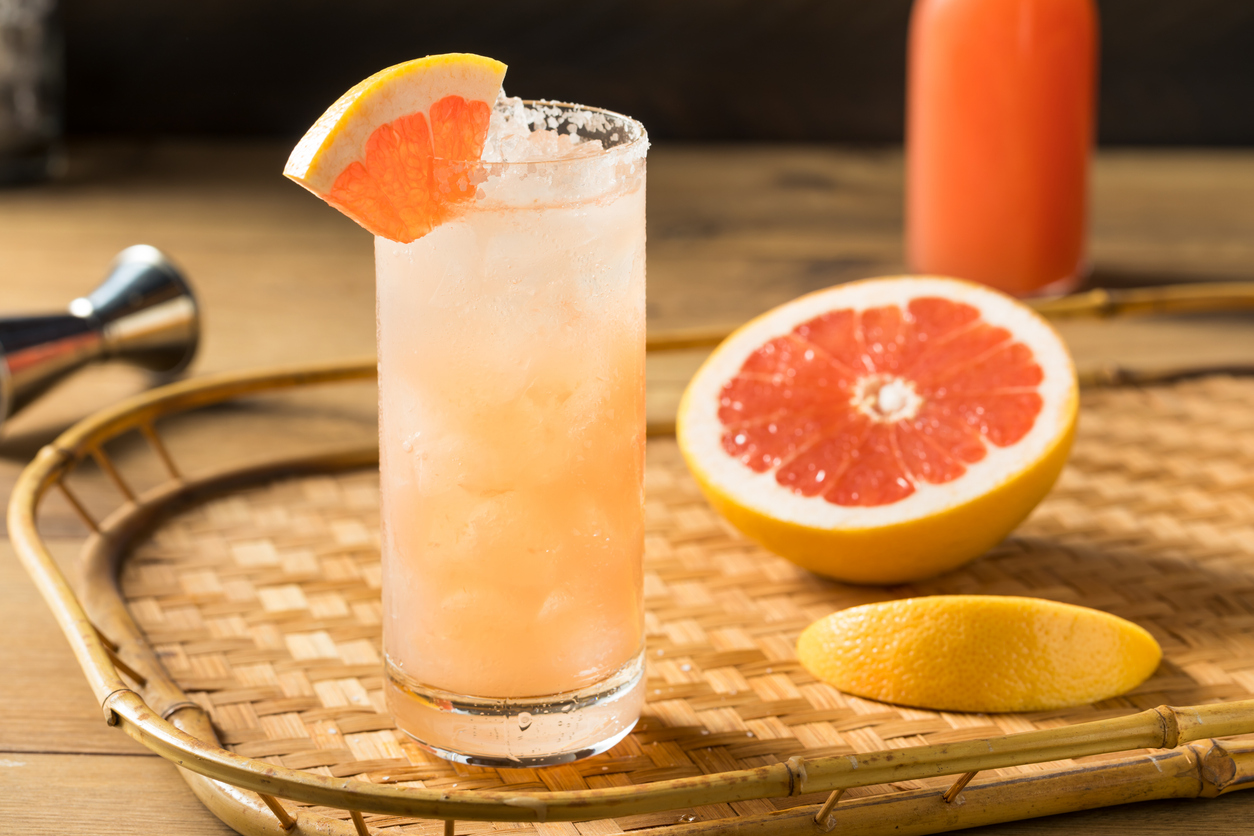 Refreshing boozy tequila grapefruit Paloma with a salted rim